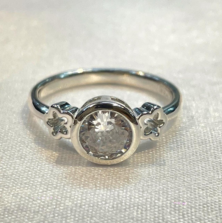 Sterling Silver CZ Bezel Solitaire Ring With Floral Side Motifs Suvera Jewelery 925_Silver_Jewelry Anniversary_Gift Christmas_Gift CZ_Diamond_Band Dainty_Ring Delicate_Ring Engagement_Band Gift_For_Her Proposal_Band Silver_Ring